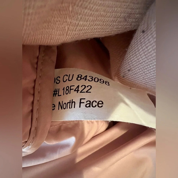 The north face 
Pink puffer vest 
Pilling on inside, Small stains on front - Picture 9 of 9